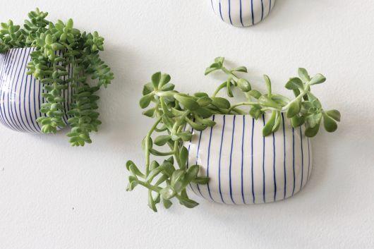 blue and white ceramic hanging planter Accent Decor Wim Wall Planter